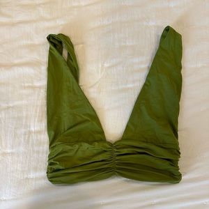 Work once. Riot swim top. Color is Matcha.